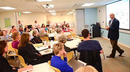 CRH CEO Jim Bickel speaking to a group in the Think Tank